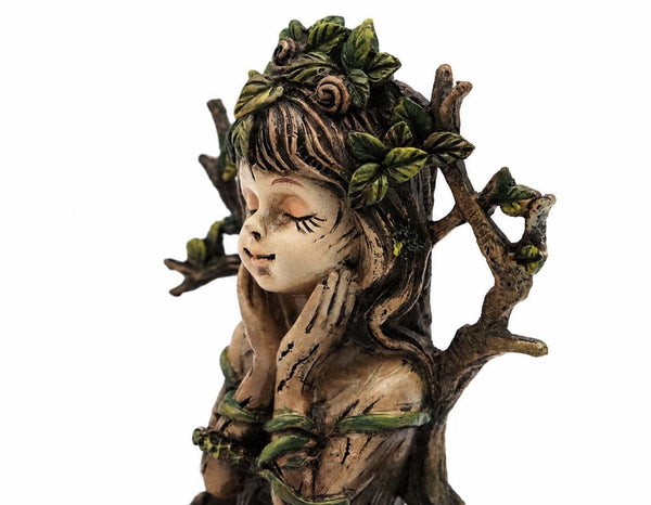 Tree Ent Girl Sitting