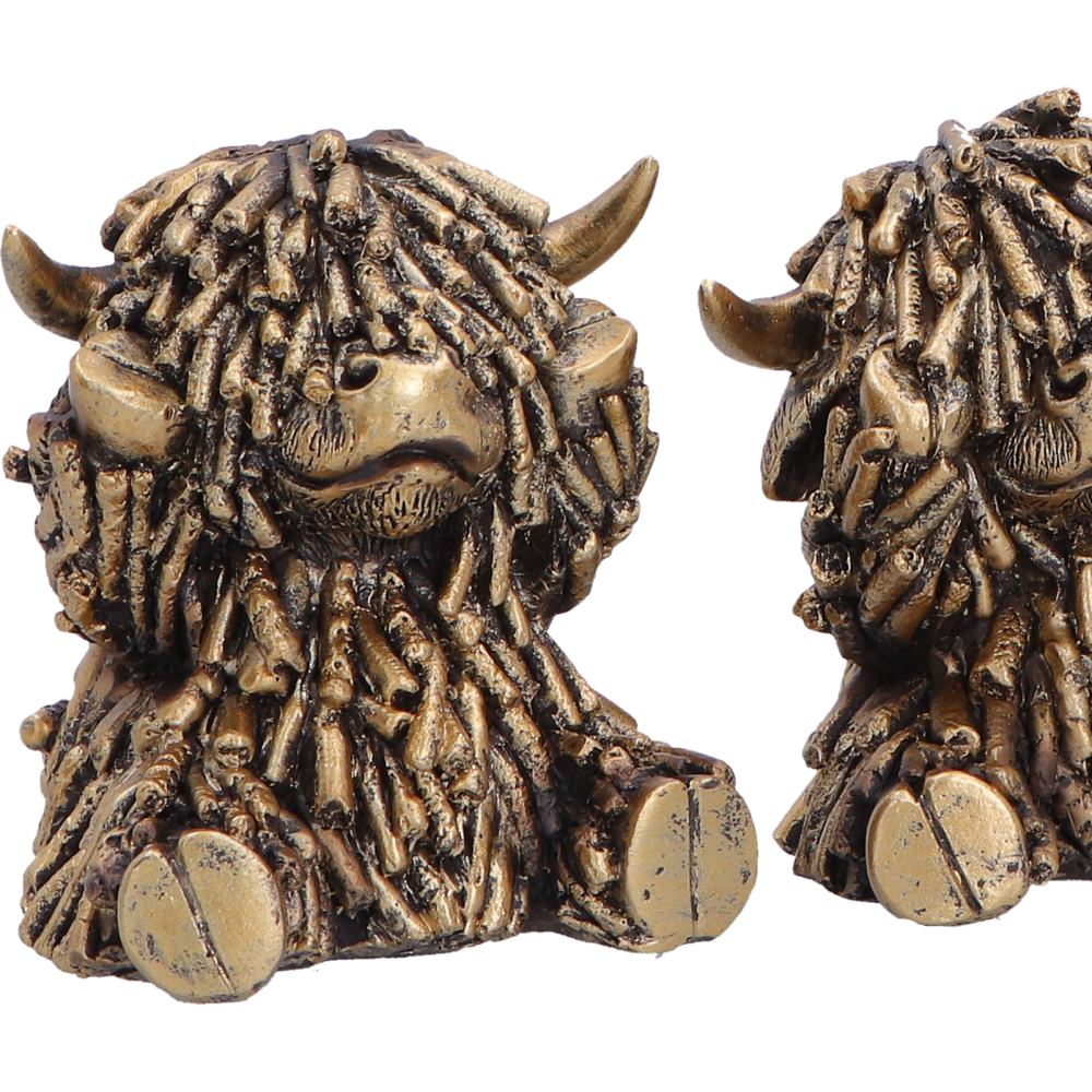 Three Wise Gold Highland Cows